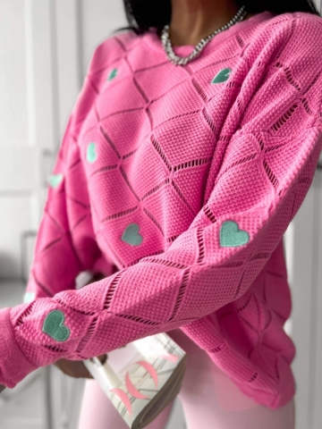 Różowy ażurowy sweterek w serduszka